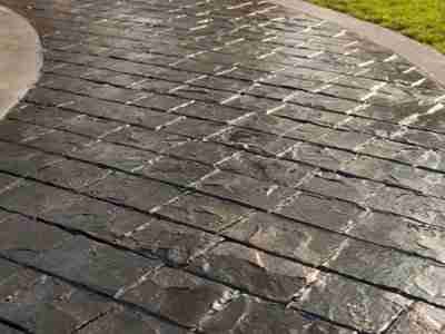 A close up of the wet brick walkway